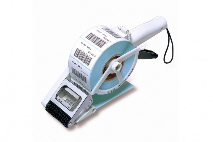 Machine de gravure, découpe et flocage textile - Agis Étiquette